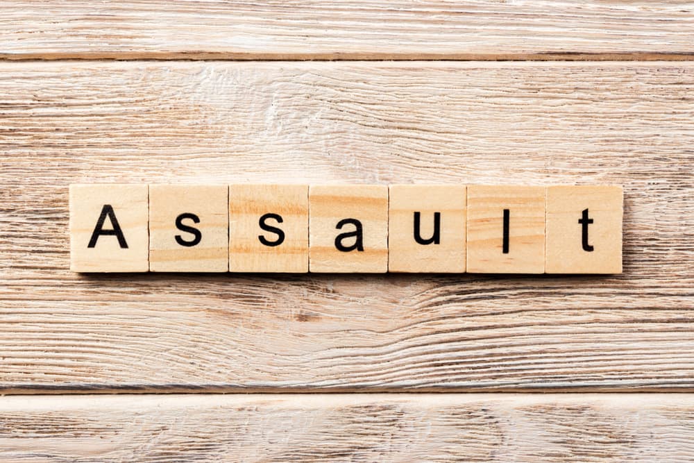 Assault Word Written In Wooden Cube.